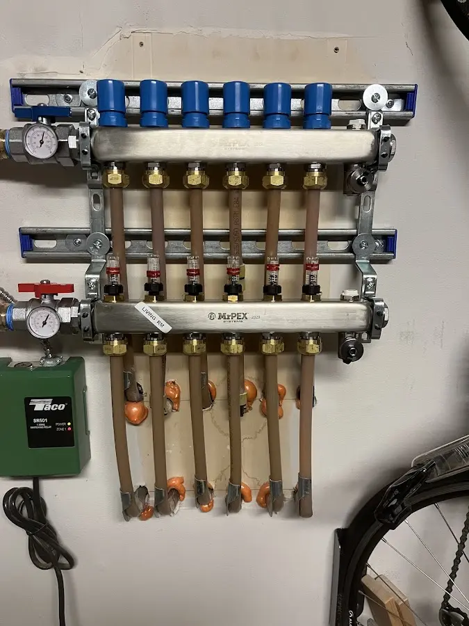 Plumber performing Water Heater Repair at a residential property in Nampa